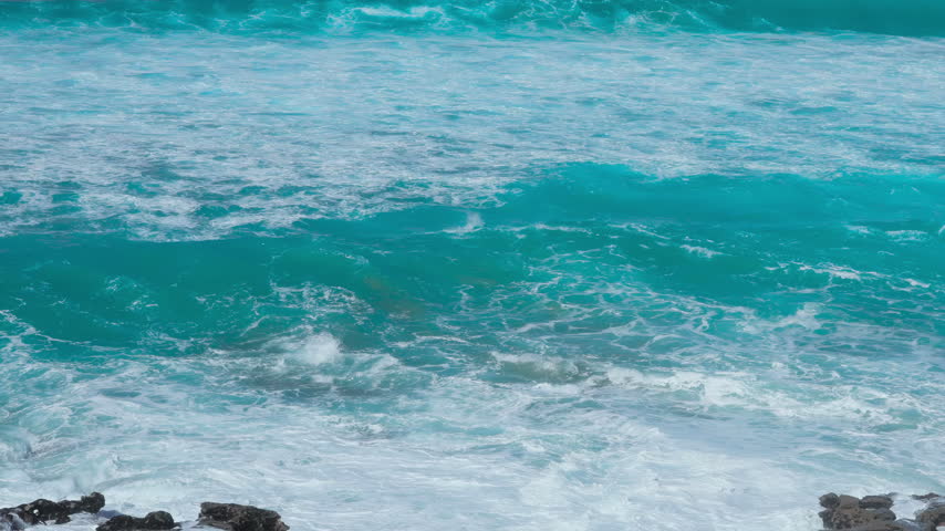 Ocean Waves Crashing on Rocky Shore