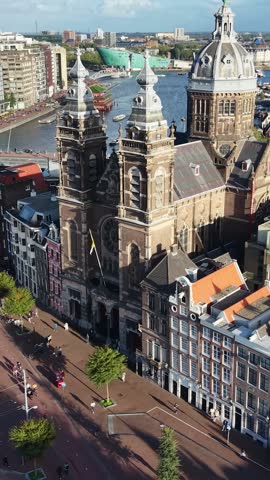 Saint Nicholas Basilica In Amsterdam In North Holland Netherlands. Beautiful Cityscape. Catholic Church. Religion Landscape. Saint Nicholas Basilica In Amsterdam. Downtown District. Tourism Landmark.
