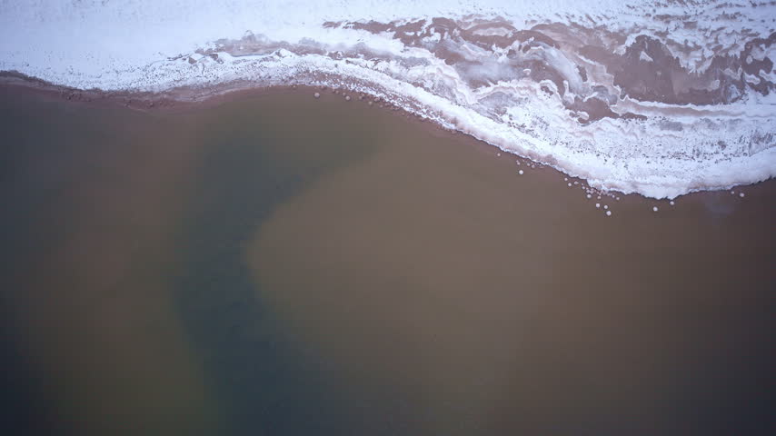 Drone footage of the winter shoreline along Lake Superior in Northern Michigan