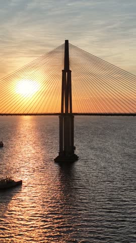 Amazonian Sunset At Manaus In Amazonas Brazil. Sunset Bridge. Boat Sailing. Amazon Black River. Amazonian Sunset In Manaus In Amazonas Brazil. Beautiful Sunset Skyline. Amazon Rainforest.