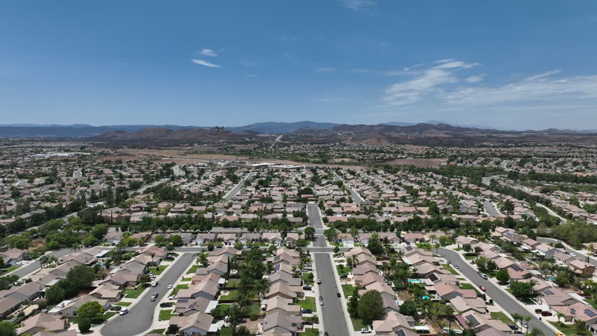 Aerial View of construction communities, developed subdivisions, single-family and manufactured homes in Winchester, Inland Empire region of Riverside County, California, USA