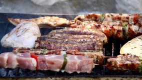 Barbecue Roasting at backyard, Sausages, pork, kebab, souvlaki... 1920X1080 HD video, close up
