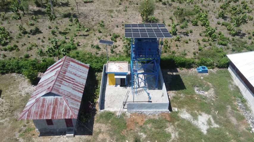 Drone Shot of Small Rural Settlement Along a Dirt Road in the Countryside