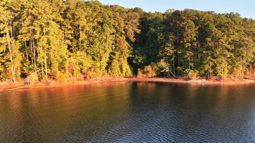 Cinematic 4K drone footage of Allatoona Landing in Cartersville, Georgia. Warm morning sun and vast landscapes
