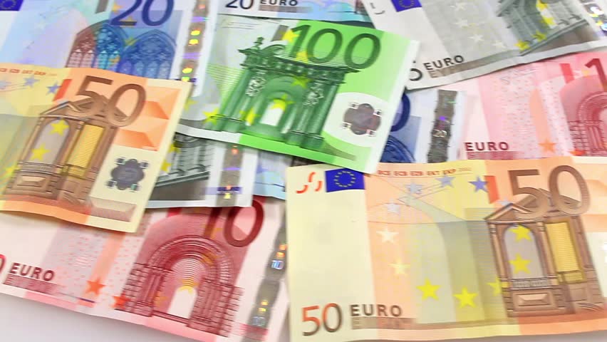 Camera pans left to right over Euro banknotes. Pan Video.
