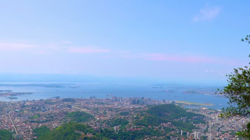 Full panoramic view across Rio de Janeiro featuring Christ the Redeemer, Copacabana, Ipanema, Sugarloaf Mountain, beaches, sea, hills and surrounding mountains in Rio de Janeiro State of Rio de Janeiro Brazil.