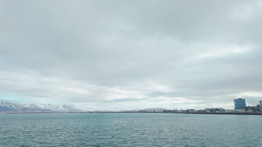 A view from the water of Reykjavik, Iceland and the surrounding Mountains.