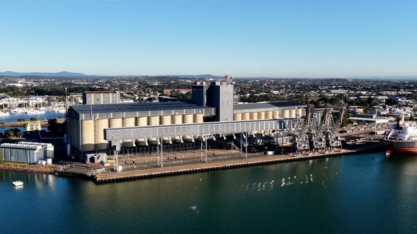 Hunter river harbour waterfront of City of Newcastle industrial port infrastructure in Australia.