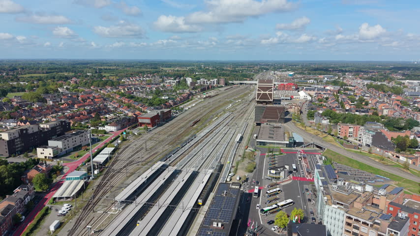 Aerial Pullback from Train Station District in Hasselt on a Sunny Day