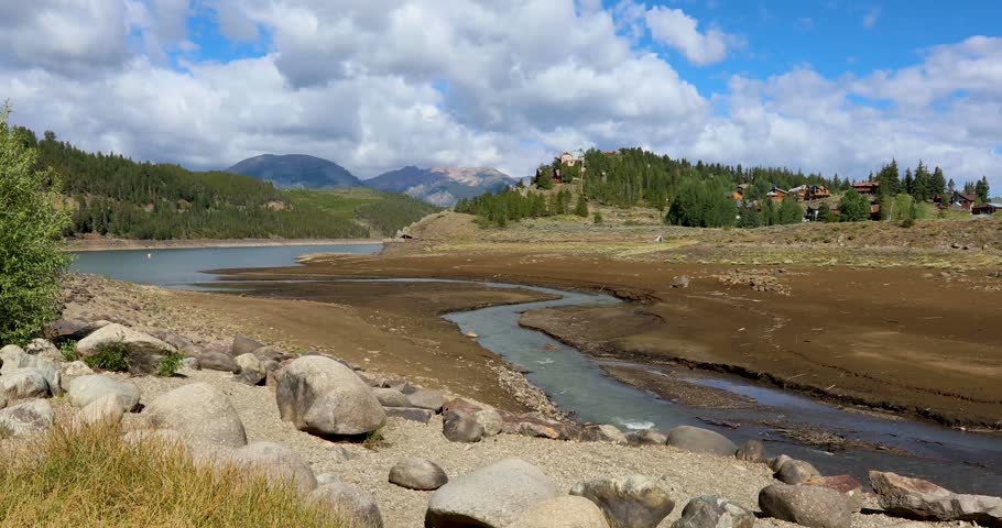 Static video of Snake River Inlet on Dillon Reservoir in Colorado. Water level is extremely low. Shot in July of 2026