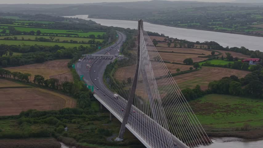 The Thomas Francis Meagher Bridge is a striking cable-stayed bridge crossing the River Suir, surrounded by the rolling countryside of Ireland’s southeast.