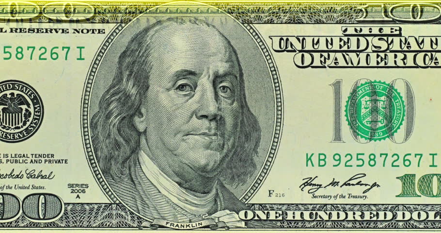Benjamin Franklin portrait anchors colorful United States banknote artwork. Engraved details and national emblems form striking historic design.