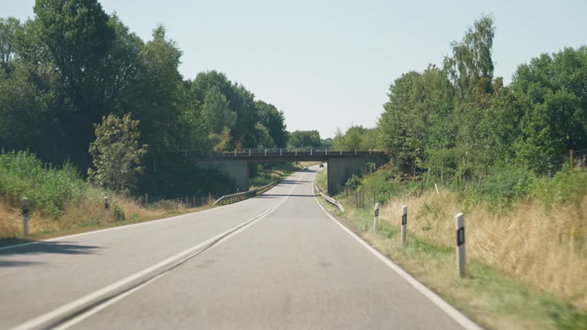 View of the road through the car
