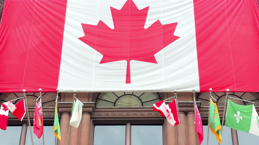 Close up of a large Canadian flag in the colonial Legislative Assembly of Ontario building. 