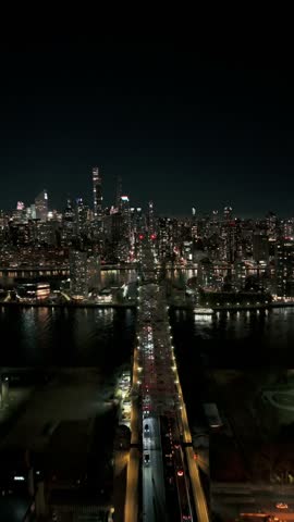 Vertical video: Queensboro Bridge over East River connecting Long Island City neighborhood in the borough of Queens with the East Midtown and Upper East Side neighborhoods in Manhattan
