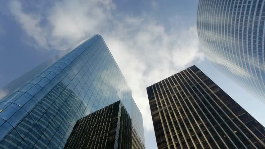 Low angle view of corporate office buildings in a financial district.