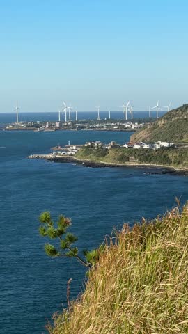 It‘s the view of Aewol Shinchang Fengcha Coast Road in Jeju Island, Republic of Korea.