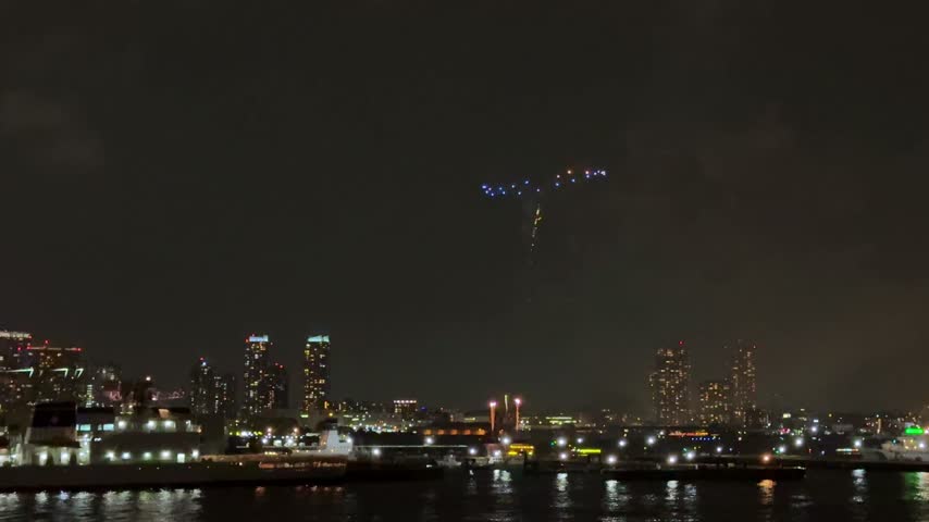 Blue Ring Firework Above the Yokohama Night Skyline