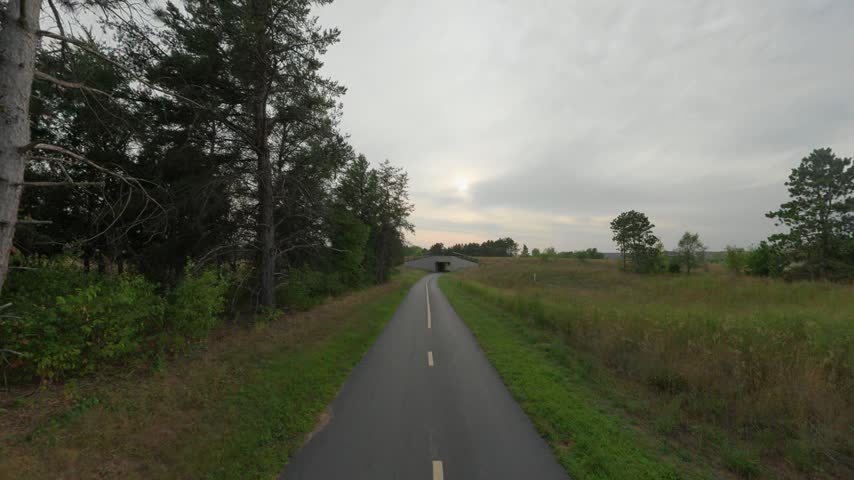 Driving Along the Quiet Rush Creek Regional Trail in Minnesota, USA - POV Shot