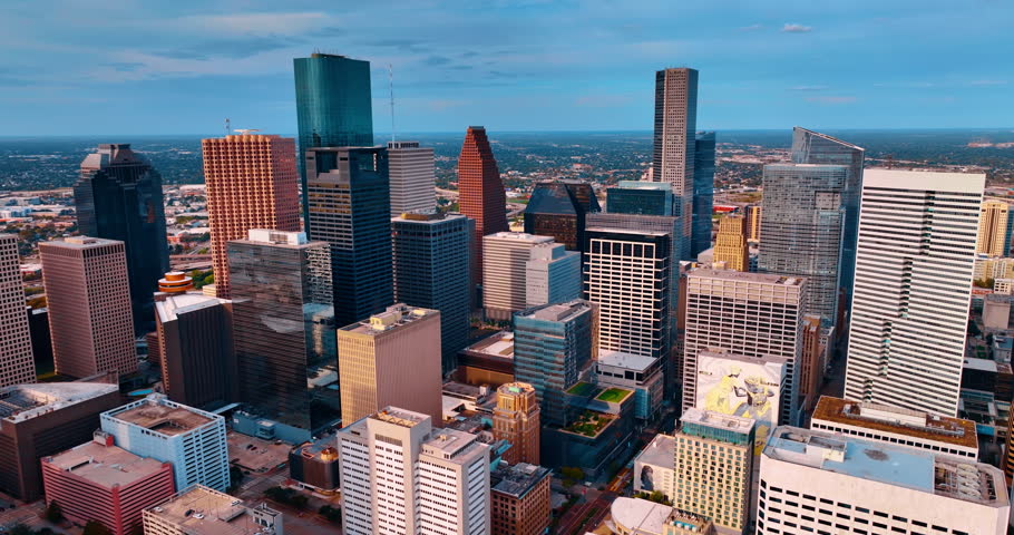 Group of variegated high-rises in the financial city center. Beautiful downtown of Houston, Texas, USA from drone footage.