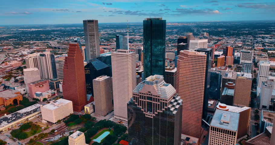 Beautiful design of the high-rises in Houston downtown, Texas, USA. Vast scenery of the modern metropolis from drone at daytime.