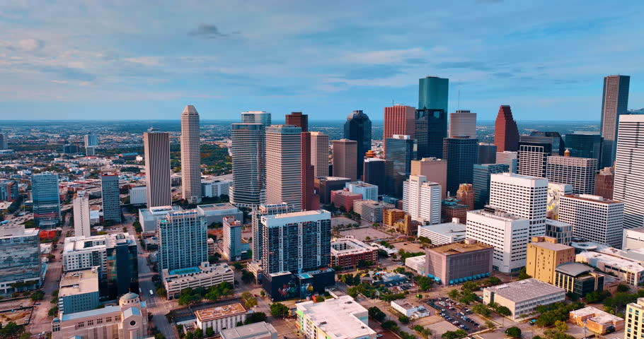 Daytime flight over the high-rise downtown of Houston, Texas, USA. Modern city scenery from drone.