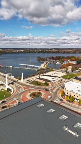 Aerial Hyper lapse of Downtown De Pere Wisconsin on the Fox River during Autumn Season.