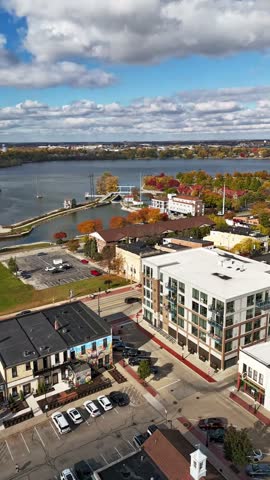 Aerial Hyper lapse of Downtown De Pere Wisconsin on the Fox River during Autumn Season.