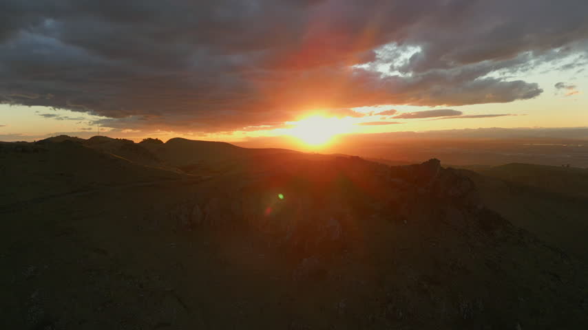 Golden Sunset Port Hills Southern Alps Winter Christchurch New Zealand Drone Track Back 4K 60FPS