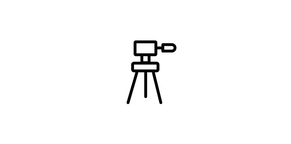 Laser Scanner on Tripod Measures Object with Light Beam