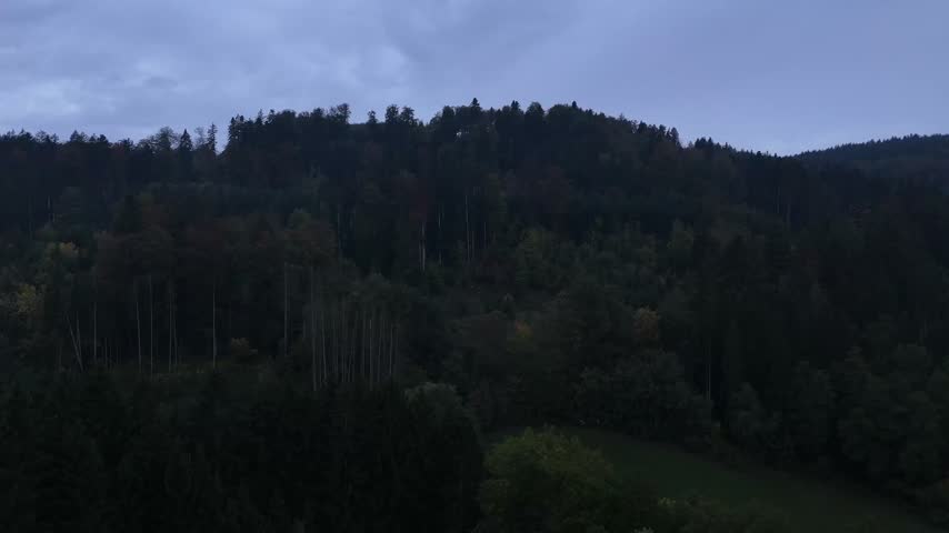 Dark Forested Hills During Blue Hour Twilight
