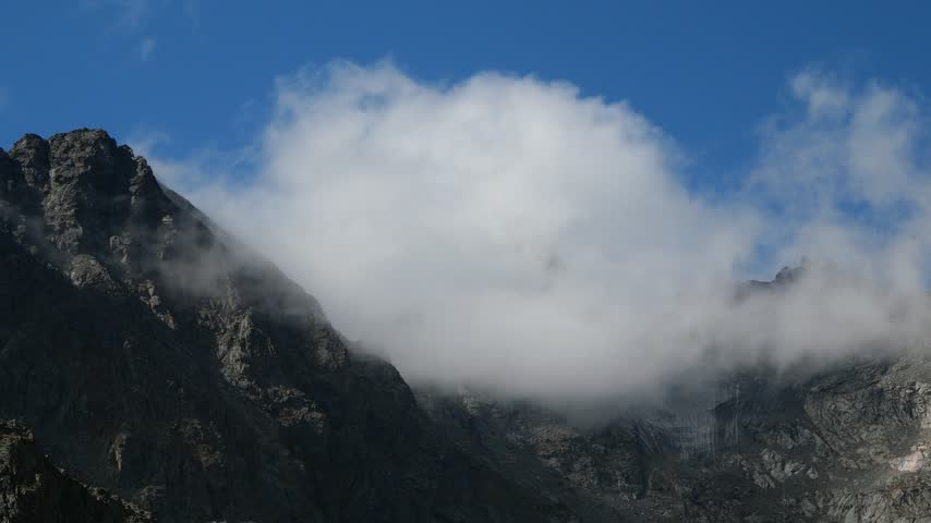 Dramatic Clouds Flow Over Navajo Peak in Colorado Rocky Mountains