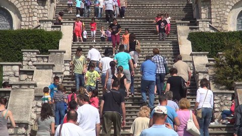 ROMANIA MATEIAS MAUSOLEUM, JUNE 8, 2013, Photographer Taking a Picture, Crowd of People, Tourists, Visiting a Mausoleum