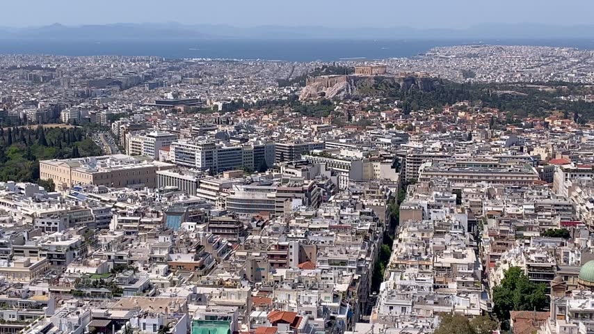 Athens aerial view over city to Acropolis Parthenon temples Mediterranean	