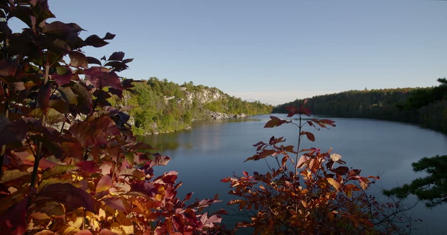 View of the Minnewaska State Park Lake through autumn leaves