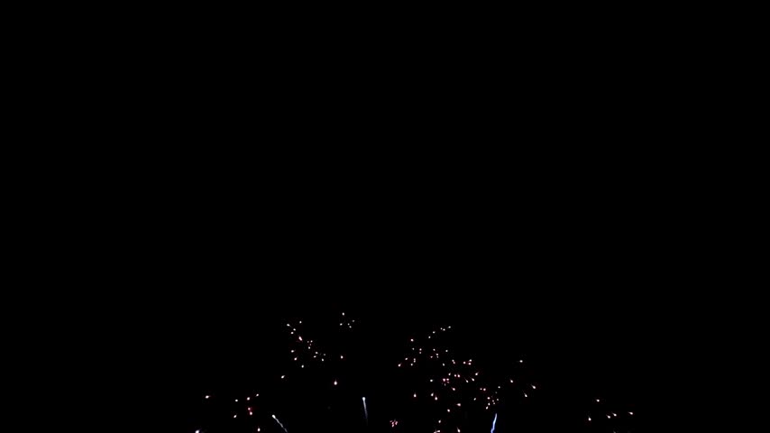 Festive firework starbursts celebrating New Year
