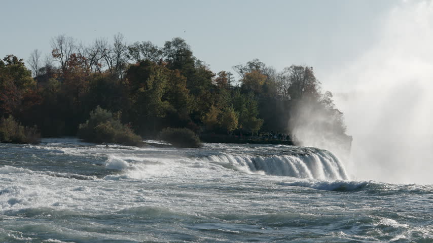 Misty view of the Niagara River flowing at the American Niagara Falls