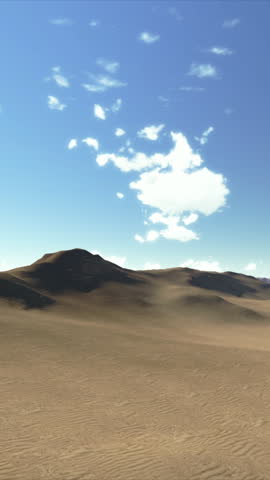 Aerial view flying over a vast and arid desert with rolling dunes under a clear blue sky