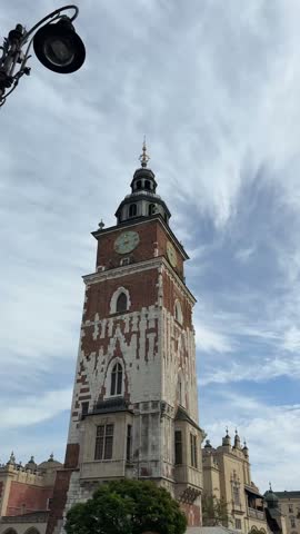 Vertical view of the historic Town Hall Tower in Krakow old town Poland