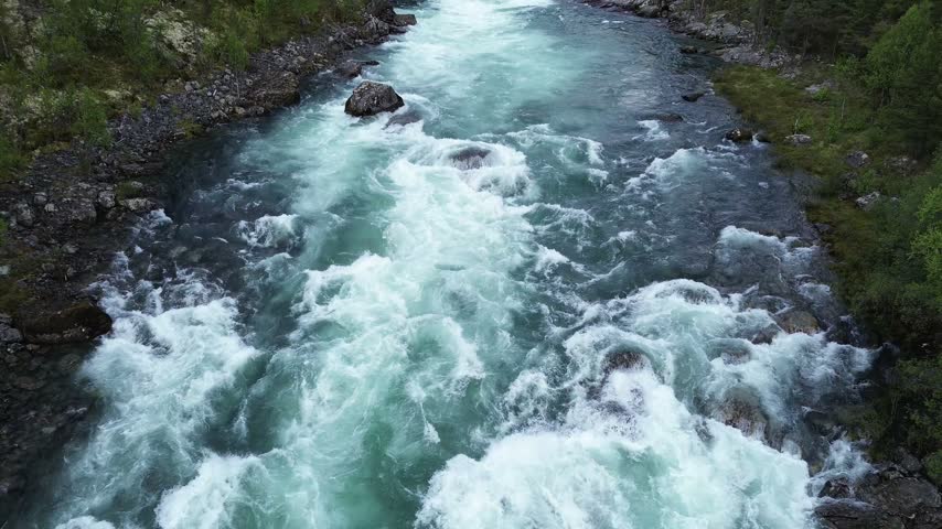 Ascending Drone Flight Upstream Along Sjoa River at Ridderspranget, Norway