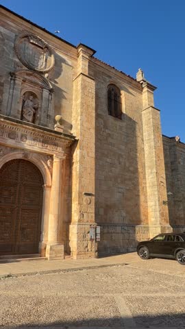 Stunning stone facade of the Herrerian style Collegial Church of San Pedro Apostol in Lerma, a medieval town in Burgos, Spain