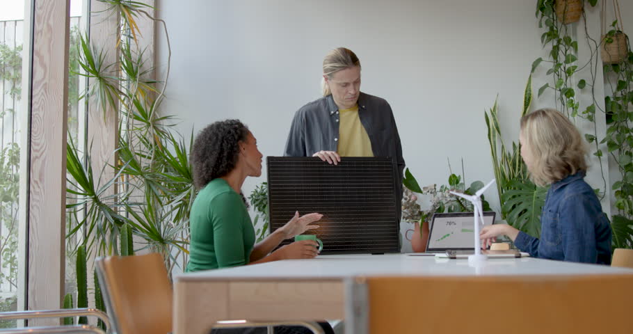 Team Meeting with in Modern Office wioth Green Plants