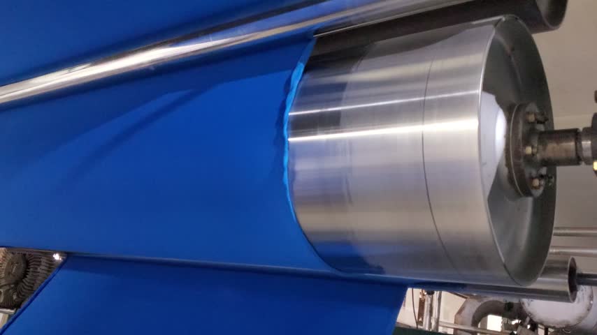 Bangladesh garments factory textile roller machine processing blue fabric


Industrial textile roller machine processing bright blue fabric in Bangladesh garments factory. Automated fabric production line showing textile manufacturing technology and material handling, 4K footage.
