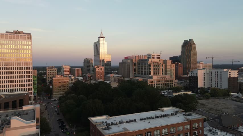 Aerial view of the downtown Raleigh, North Carolina skyline at sunset