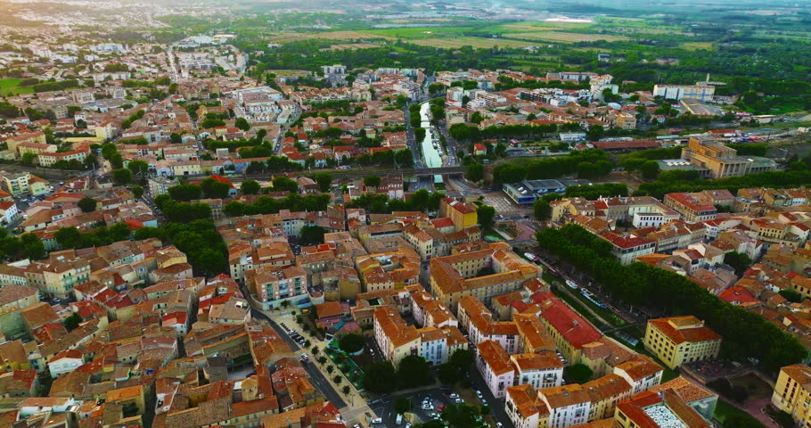 Aerial view the beautiful historic city of Montpellier in southern France, known for its architecture, charming streets, the Place de la Comedie, its old town center, and its Mediterranean atmosphere