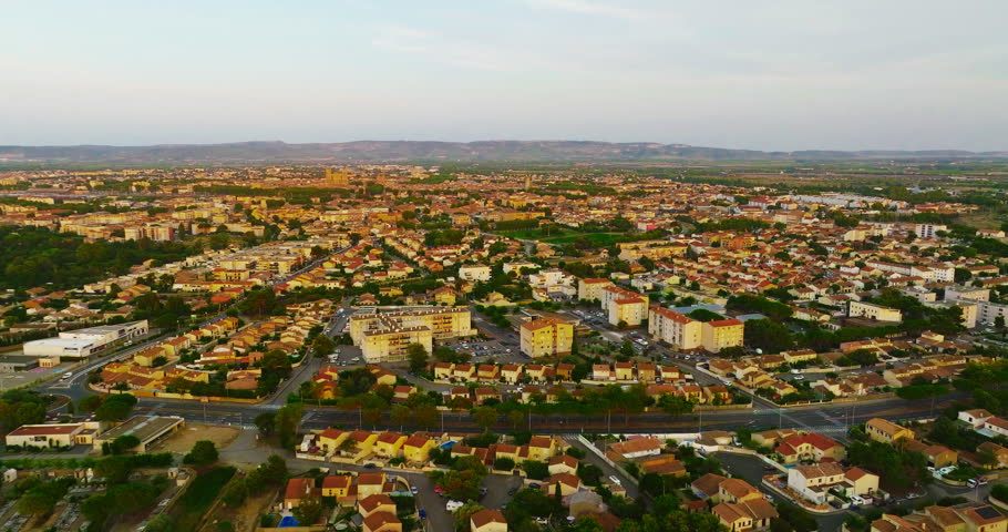 Aerial view the beautiful historic city of Montpellier in southern France, known for its architecture, charming streets, the Place de la Comedie, its old town center, and its Mediterranean atmosphere