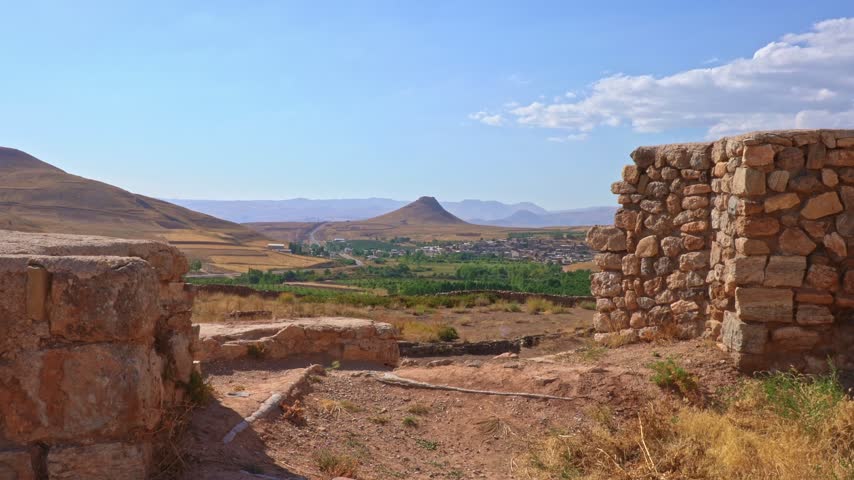 View of the Prison of Solomon a hollow cone-shaped hill where it used to be an Artesian spring from the Takhte Soleyman (Throne of Solomon) an archaeological site in West Azerbaijan, Iran. The site holds the ruins of the most significant Zoroastrian fire temple from the Sassanid period