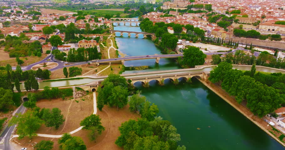 Aerial view of Beziers, charming historic city in southern France, known for the Cathedral of Saint Nazaire, the Canal du Midi, picturesque streets, traditional French architecture
