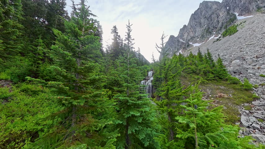 Waterfall Pours Down from park Creek Pass in North Cascades National Park