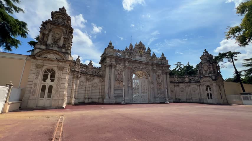 TURKEY - August 3, 2024: The openwork gates of the Dolmabahce Palace, adorned with stone and metal patterns, are located on the European side of Istanbul, on the banks of the Bosphorus. 4К